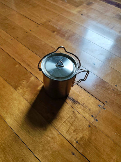 750ml stainless steel camp cook pot with lid and hanging hook, compatible with fire and gas, by Mead's Supply & Equipment Outfitters