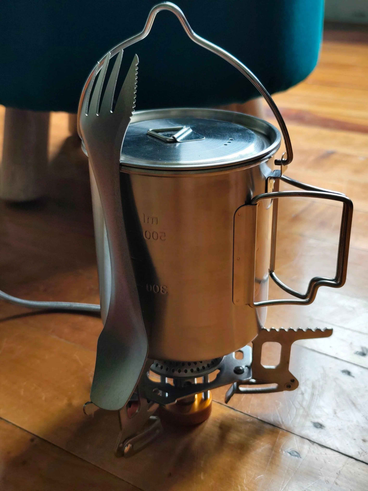 750ml stainless steel camp cook pot with lid and hanging hook, fire and gas compatible from Mead's Supply & Equipment Outfitters.