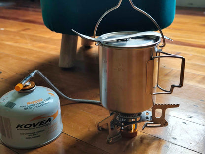 750ml stainless steel camp cook pot with lid and hanging hook, compatible with fire and gas, from Mead's Supply & Equipment Outfitters