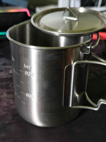 Stainless steel 750ml camp cook pot with lid and hanging hook, compatible with fire and gas, by Mead's Supply & Equipment Outfitters