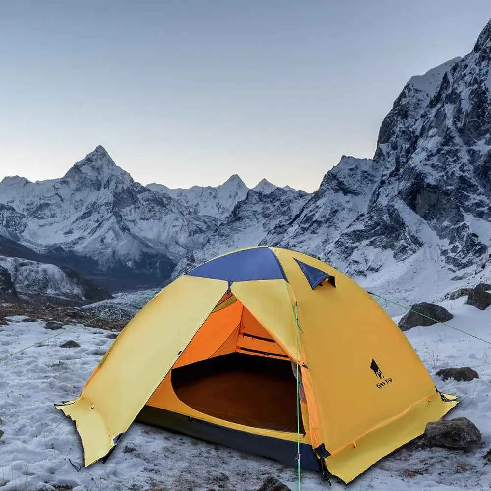 Outdoor folding camping tent in army green by Mead's Supply & Equipment Outfitters, set up outdoors for camping.