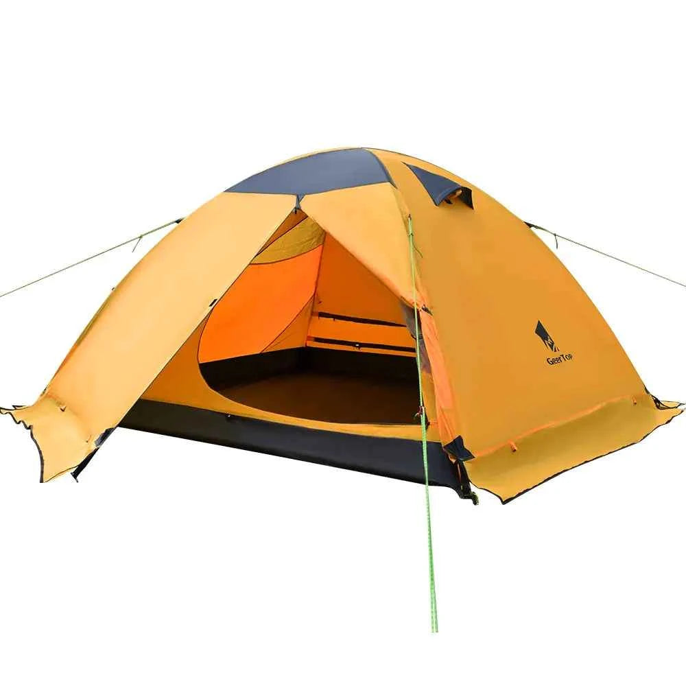 Army green outdoor folding camping tent by Mead's Supply & Equipment Outfitters, set up in a natural outdoor environment.