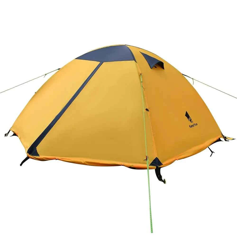 Outdoor green folding camping tent from Mead's Supply & Equipment Outfitters, set up in a natural outdoor setting.