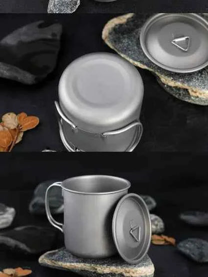 Titanium folding camping cup with lid from Mead's Supply & Equipment Outfitters, collapsible and lightweight outdoor drinkware.