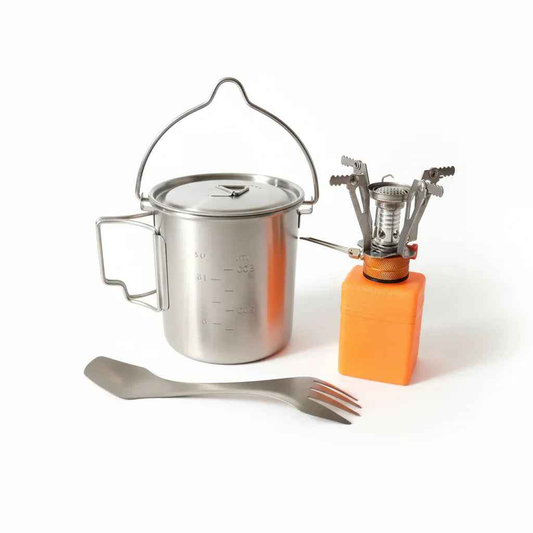 Complete camp kitchen bundle with pot, burner, and titanium utensil from Mead's Supply & Equipment Outfitters, ideal for camping.