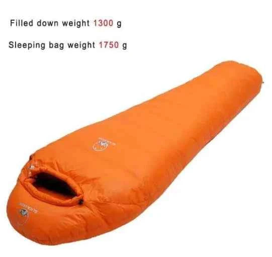 Green goose down sleeping bag by Mead's Supply & Equipment Outfitters, lightweight insulated camping gear for warmth and comfort.