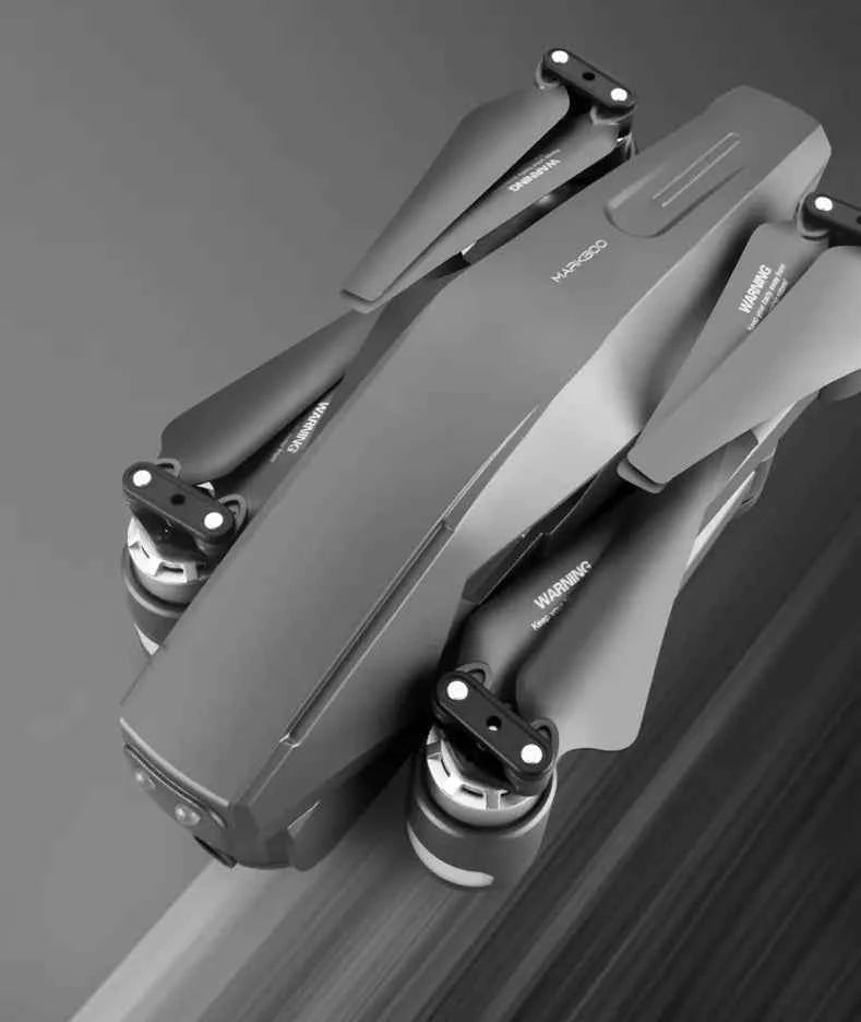 Professional 4K HD foldable GPS drone by Mead's Supply & Equipment, showing its compact design for aerial photography and camping use.