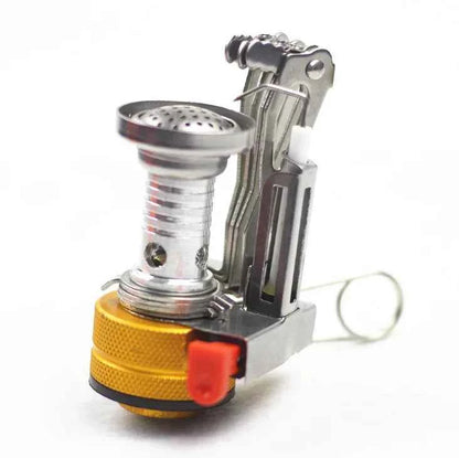 Orange portable mini camping stove by Mead's Supply & Equipment, lightweight aluminum butane burner for outdoor cooking for 1-3 people.