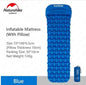 Orange outdoor inflatable camping mattress with built-in air bag and pillow options, moisture-proof sleep pad for 1 or 2 people.