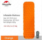 Orange outdoor inflatable mattress by Mead's Supply & Equipment Outfitters with built-in air bag and pillow options for camping sleep pads.