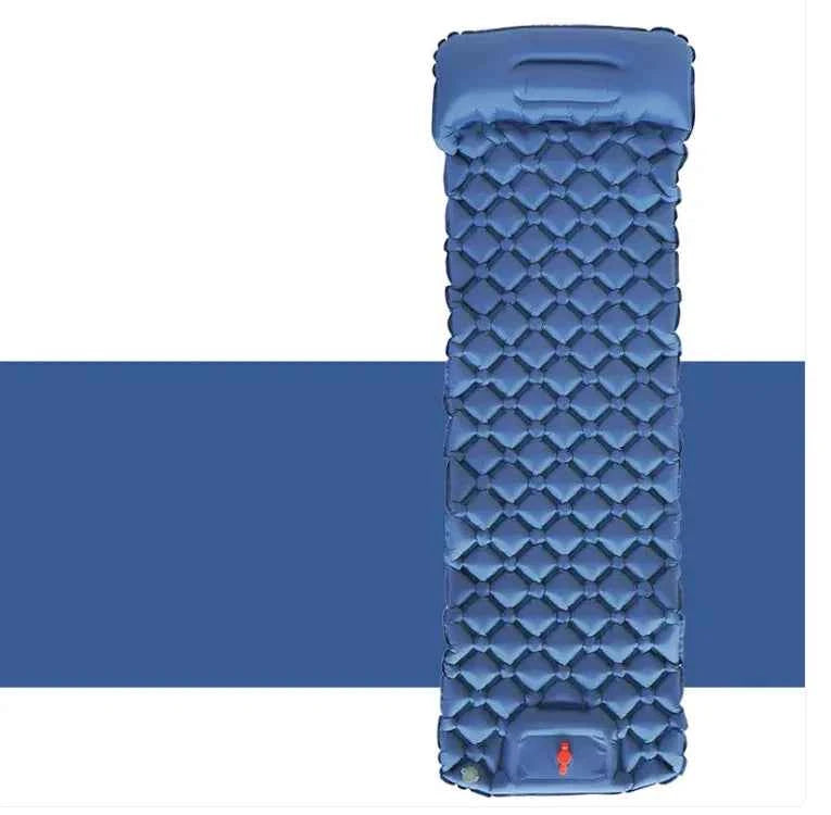 Royal blue outdoor camping press inflatable sleeping pad by Mead's Supply with built-in pillow, lightweight mat for camping trips.