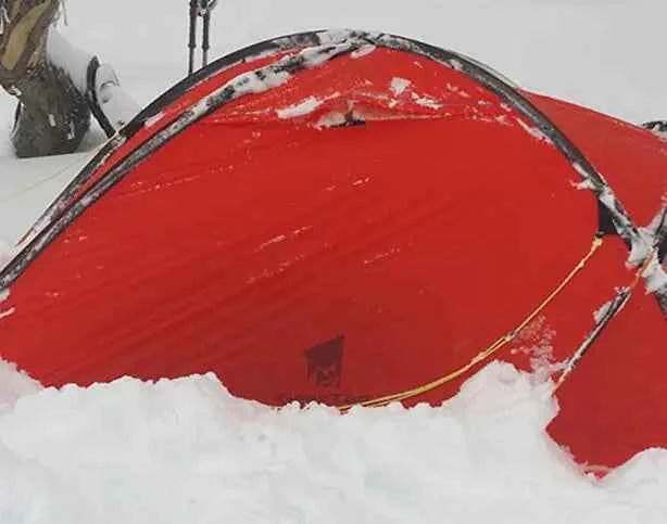 Yellow winter double layer waterproof camping tent for hiking, designed for 2 people, 4-season camping by Mead's Supply & Equipment.
