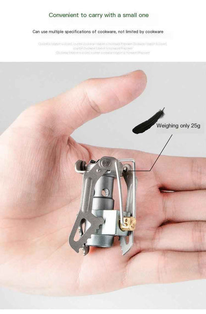 Portable outdoor titanium gas stove from Mead's Supply & Equipment Outfitters, lightweight camping and hiking gear with compact design