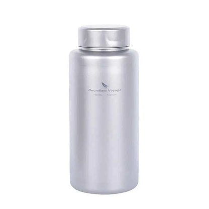 Silver titanium outdoor water bottle by Mead's Supply, 1000ml lightweight camping flask, leak-proof hiking drinkware.
