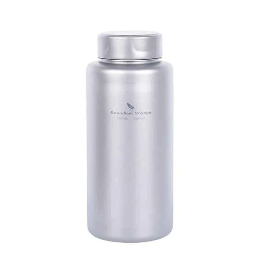 Silver titanium outdoor water bottle by Mead's Supply, 1000ml lightweight camping flask, leak-proof hiking drinkware.