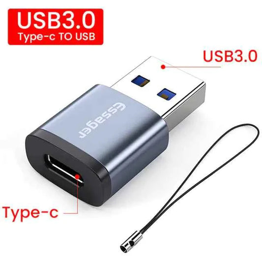 Mead's Supply & Equipment OTG Adapter USB 3.0 Type-C to USB 3.0 for multi-device connectivity, shown connected to electronic devices.