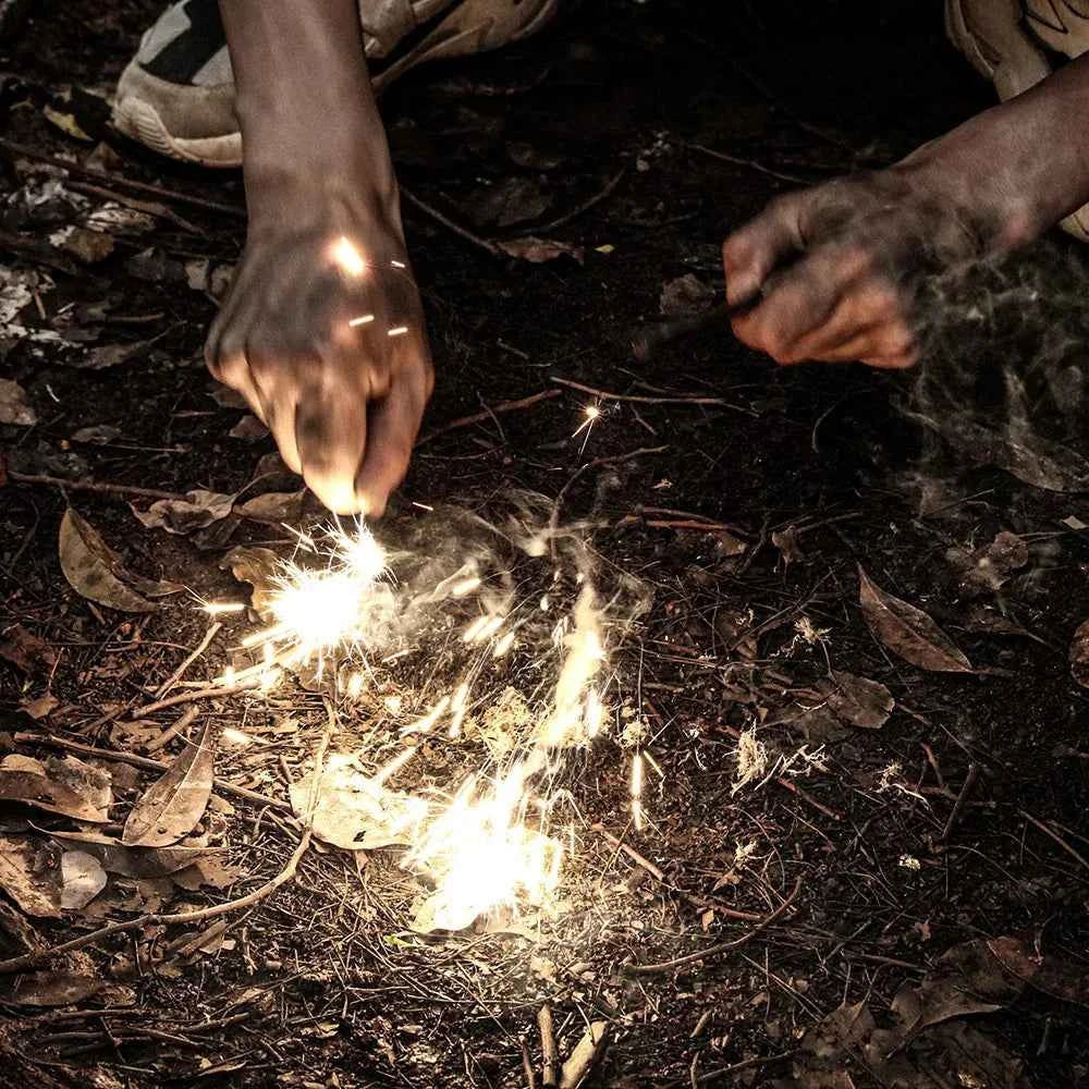 Portable outdoor flint fire starter by Mead's Supply & Equipment Outfitters, cylindrical camping equipment for reliable fire lighting.