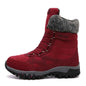 Rose red women's winter outdoor snow boots by Mead's Supply & Equipment Outfitters, designed for hiking and skiing.