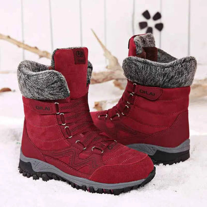 Women's winter outdoor snow boots by Mead's Supply, featuring rose-red waterproof footwear for hiking and skiing.