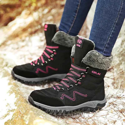 Rose red women's winter snow boots for hiking and skiing, outdoor footwear by Mead's Supply & Equipment Outfitters Limited.