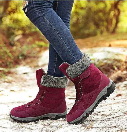 Women's Mead's Supply winter outdoor snow boots in rose red, designed for hiking and skiing, featuring waterproof material and warm insulation.
