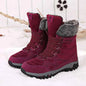 Rose red women's winter snow boots by Mead's Supply & Equipment Outfitters for hiking and skiing, featuring insulated waterproof footwear.