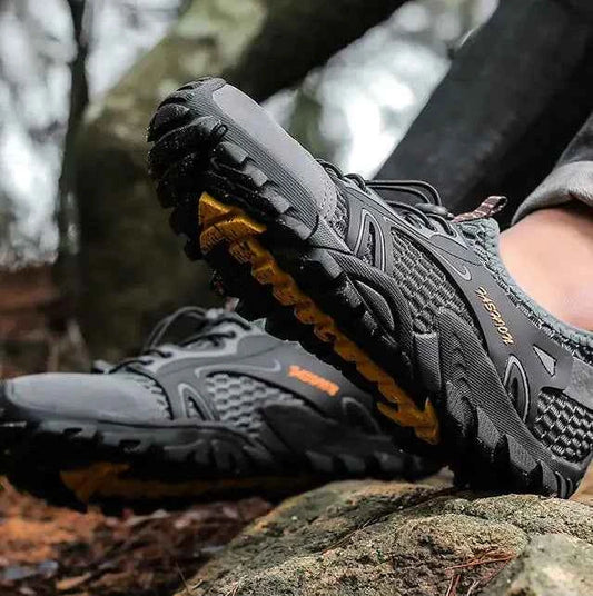 Black waterproof river trekking shoes by Mead's Supply & Equipment Outfitters, with non-slip soles for hiking and wading.