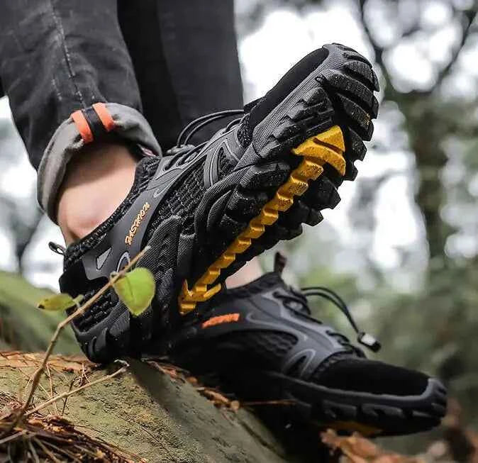 Black waterproof river trekking shoes by Mead's Supply & Equipment Outfitters, featuring non-slip soles for hiking and wading.