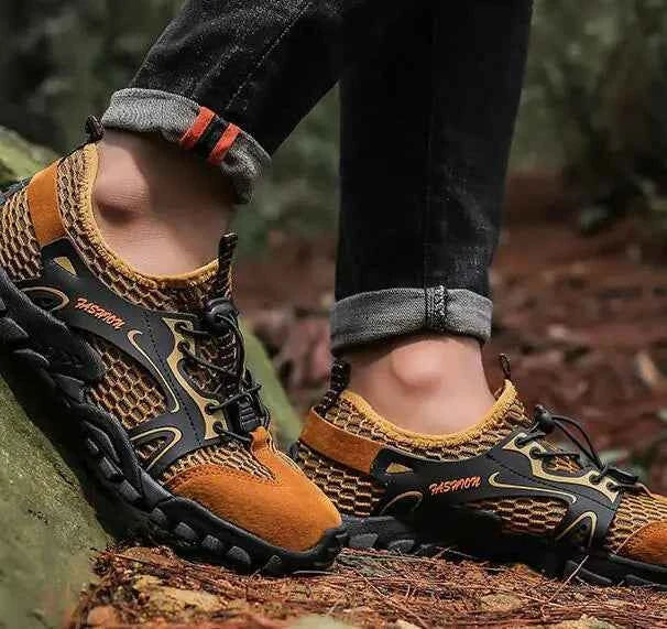 Black waterproof river trekking shoes by Mead's Supply & Equipment Outfitters, featuring non-slip soles for hiking and wading.