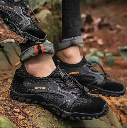 Black waterproof river trekking shoes by Mead's Supply & Equipment Outfitters, featuring non-slip soles for hiking and wading.