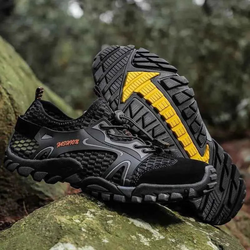 Black waterproof river trekking shoes by Mead's Supply & Equipment Outfitters, featuring non-slip soles for hiking and wading.