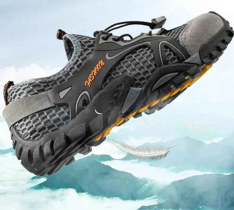 Black waterproof river trekking shoes by Mead's Supply & Equipment Outfitters, featuring non-slip soles for hiking and wading.