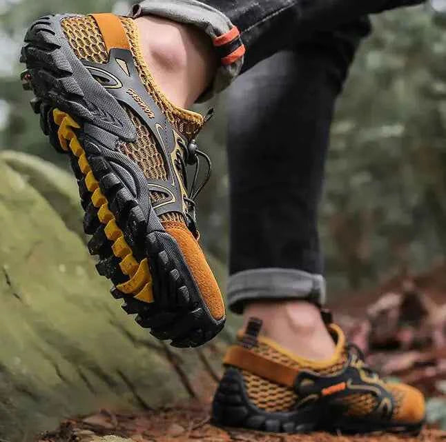 Black waterproof river trekking shoes by Mead's Supply & Equipment Outfitters, featuring non-slip soles for hiking and wading.