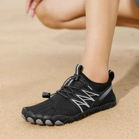 Unisex outdoor water shoes in black and green by Mead's Supply & Equipment Outfitters, designed for hiking and swimming, quick-dry material.
