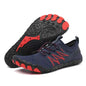 Black and green unisex outdoor water shoes by Mead's Supply & Equipment Outfitters, designed for quick-dry hiking and swimming.