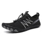 Black and green unisex outdoor water shoes by Mead's Supply & Equipment Outfitters, designed for quick-dry hiking and swimming.
