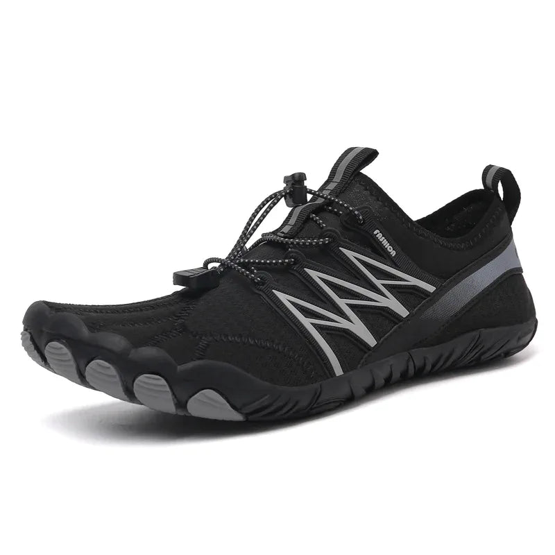 Unisex outdoor water shoes in black and green with quick-dry fabric, designed for hiking and swimming by Mead's Supply & Equipment.