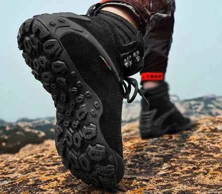 Black women's waterproof hiking boots by Mead's Supply & Equipment Outfitters, lightweight climbing shoes with rugged tread sole.
