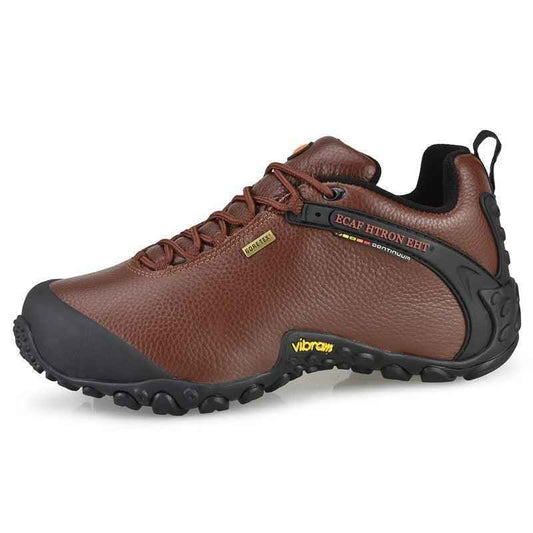 Men's and women's outdoor cowhide climbing shoes by Mead's Supply & Equipment Outfitters, brown durable hiking footwear.