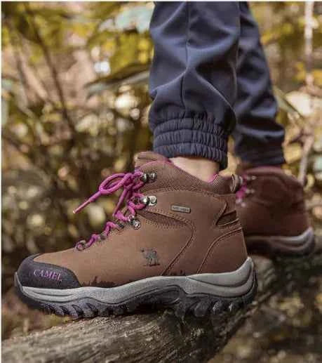 Purple waterproof high-top hiking boots for girls by Camel Brand, with sturdy design and rugged soles for outdoor adventures.