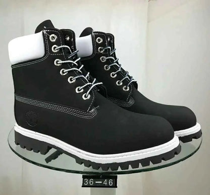 Navy blue classic waterproof leather work boots by Mead's Supply & Equipment Outfitters, unisex slip-resistant footwear for work and trails.