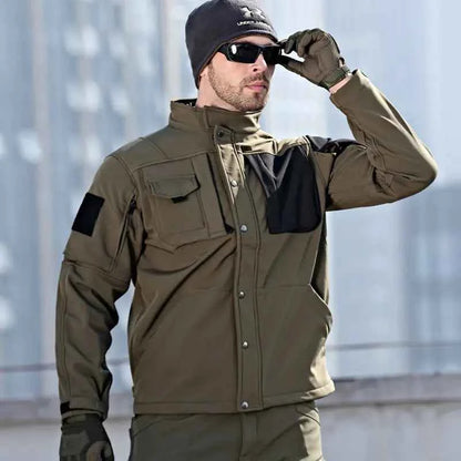Green Rhino 2.0 Tactical Softshell Jacket for Men by Mead's Supply & Equipment Outfitters, showing front view with zippered pockets