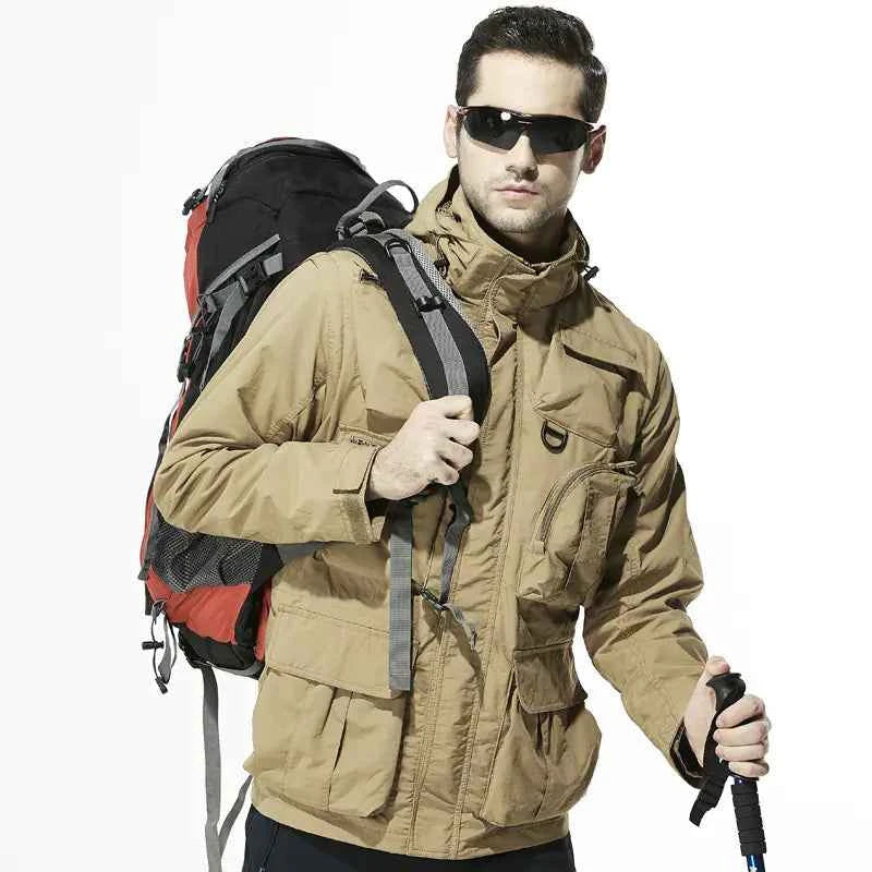 Men's tactical jacket with removable sleeves in army green, designed for fall and winter, by Mead's Supply & Equipment Outfitters.
