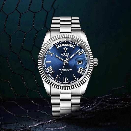 Men's Mechanical Glass Watch by Mead's Supply & Equipment, waterproof stainless steel with date display and blue steel strap.