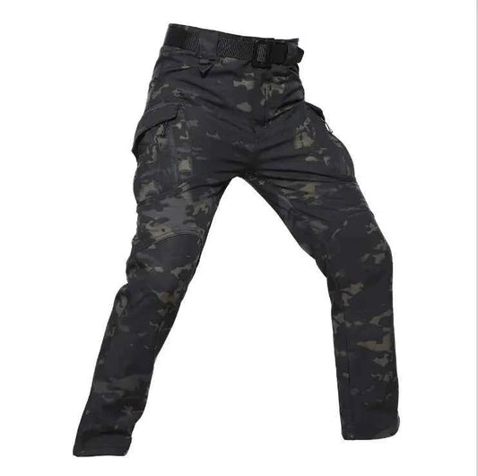 Men's tactical outdoor assault pants in shark skin soft shell with cargo pockets, military style, from Mead's Supply & Equipment Outfitters.