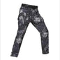 Men's tactical outdoor assault pants by Mead's Supply & Equipment in black, shark skin soft shell cargo style military pants.