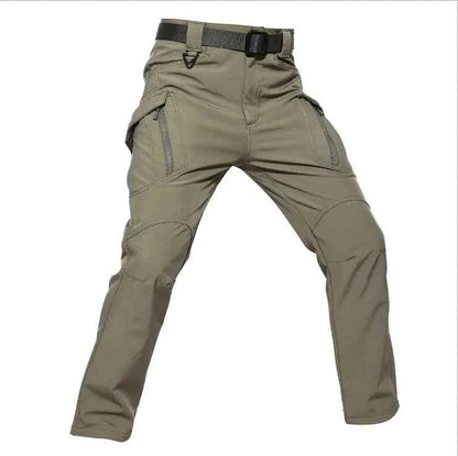 Men's tactical outdoor assault pants in black, made of shark skin soft shell fabric with cargo pockets, military style from Mead's Supply.