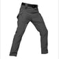 Men's tactical outdoor assault pants by Mead's Supply & Equipment, black shark skin soft shell cargo pants with military style.