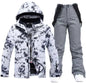 Pink men's and women's ski suit by Mead's Supply & Equipment, waterproof and windproof winter snow jacket and pants set.