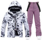 Pink men's and women's ski suit by Mead's Supply & Equipment, waterproof windproof winter snow jacket and pants, unisex 2-piece set.